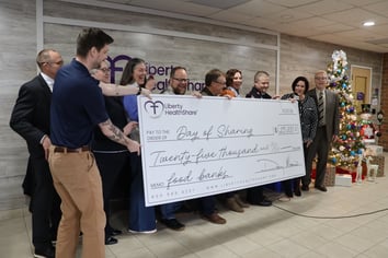 Liberty HealthShare delivers a check to five local organizations fighting hunger in Stark County, Oh…