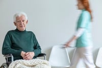 an individual reviewing an itemized bill from a recent health care related hospital visit