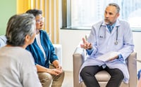 two women asking questions during a doctor visit