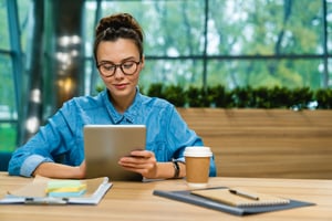 woman reading the biblical stewardship definition online