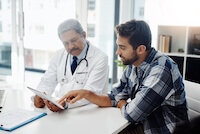 Doctor and patient discussing a health care sharing ministry