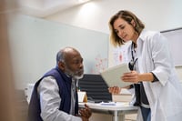 patient asking Christian doctor about the affordable care act and healthshare as an alternative for their health insurance expenses